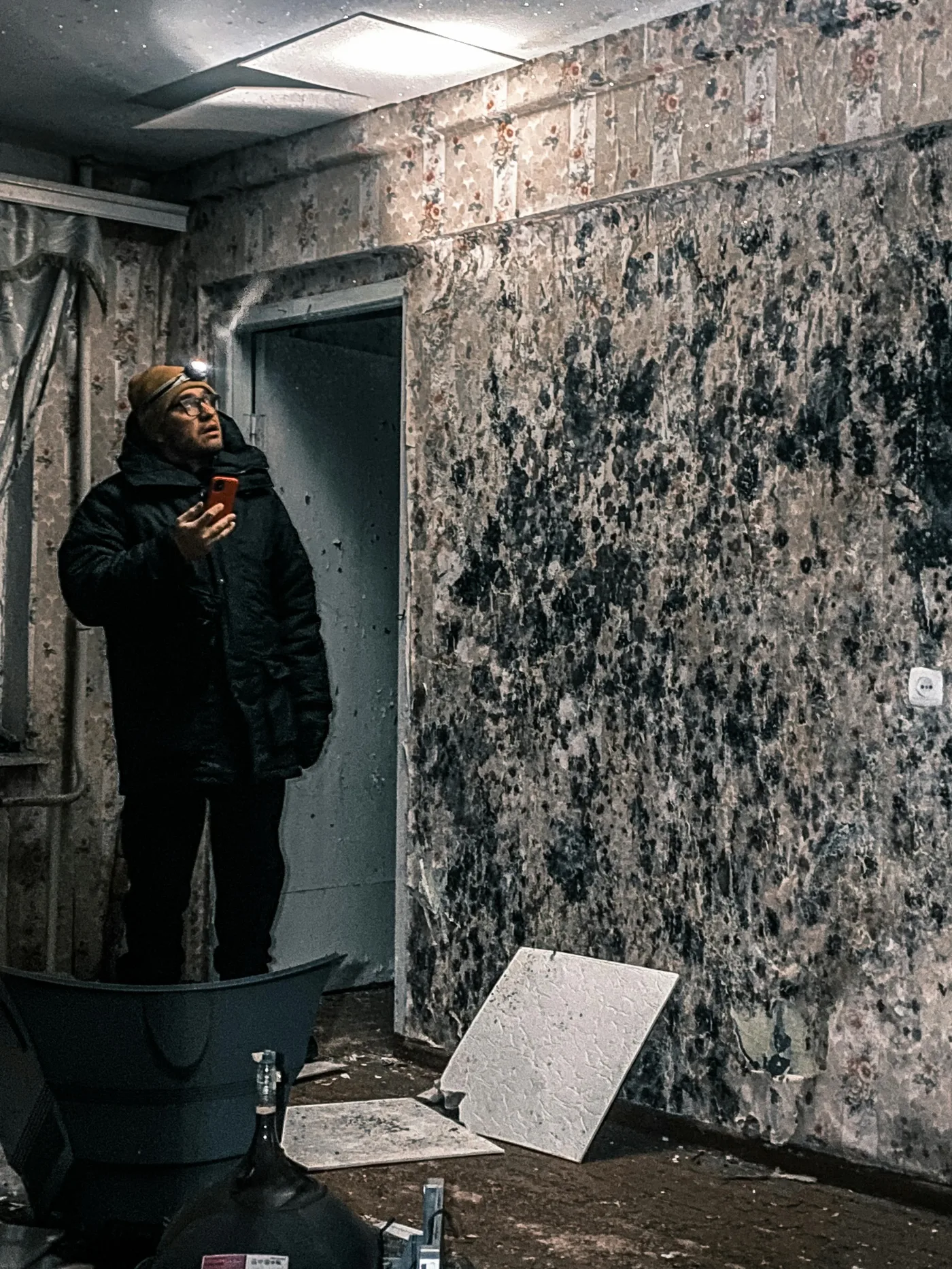 mold remediation Minneapolis Minnesota — IICRC-certified technician treating mold growth in basement